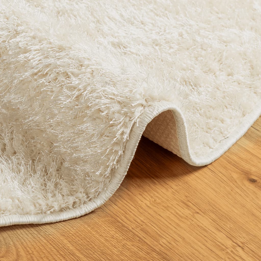 Tapis ISTAN poils longs crème brillant Ø 100 cm